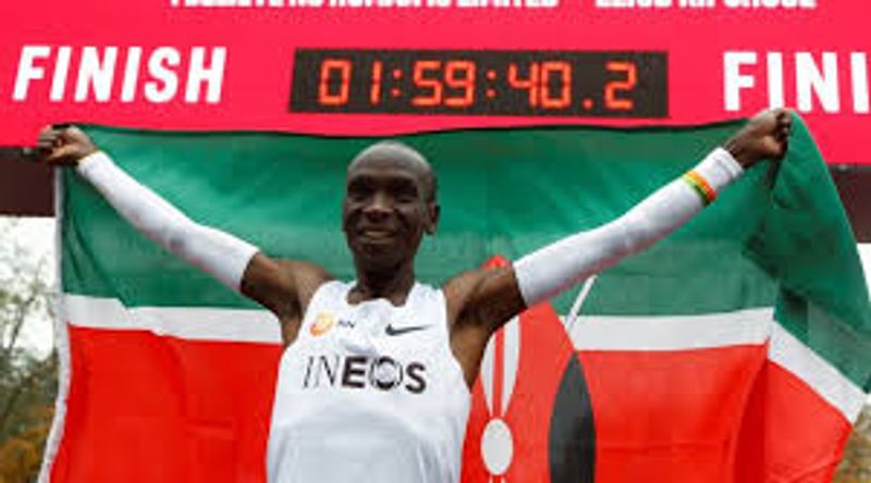 Eliud Kipchoge (marking the spot)