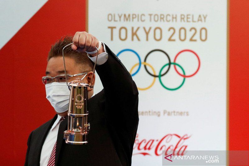 2021-03-25T003821Z_1023624941_RC20IM9FJRL5_RTRMADP_3_OLYMPICS-2020-RELAY