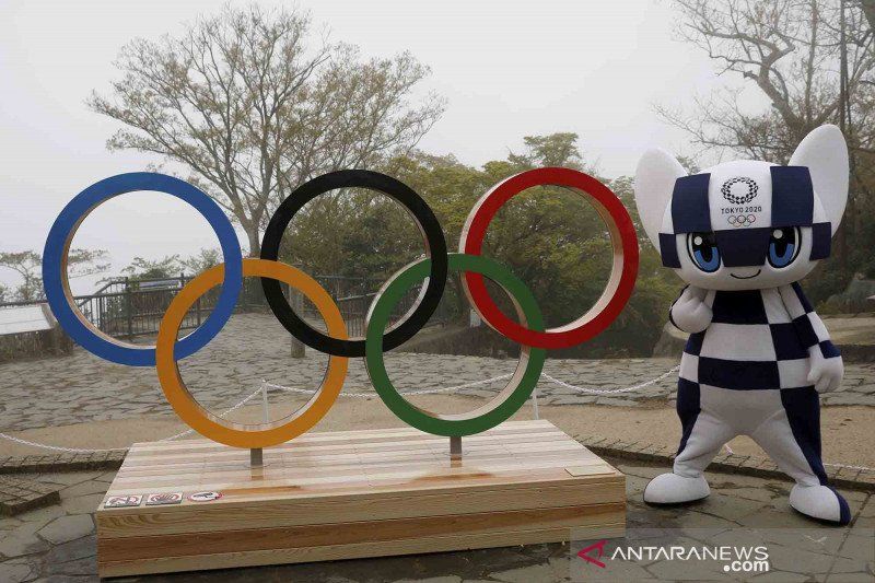 2021-04-14T025927Z_1722675202_RC2EVM9UKWJP_RTRMADP_3_OLYMPICS-2020-100-DAYS-MASC