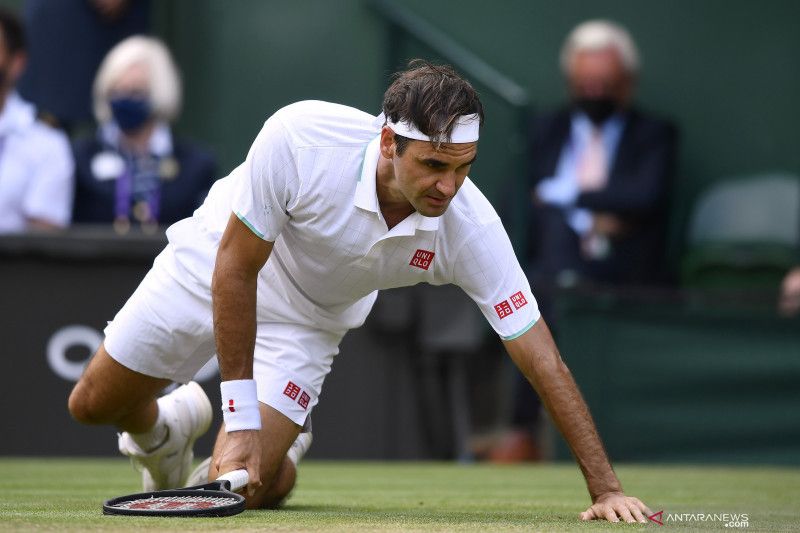 2021-07-03T180622Z_1593839162_UP1EH731EALXO_RTRMADP_3_TENNIS-WIMBLEDON
