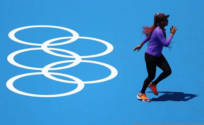 2021-07-20T041103Z_915931708_SP1EH7K0BMC0V_RTRMADP_3_OLYMPICS-2020-TENNIS-TRAINI