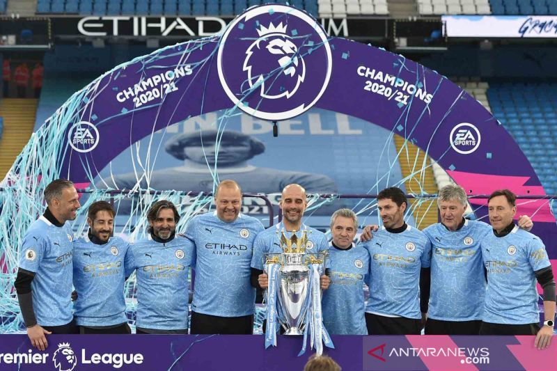 2021-05-23T183540Z_1671845674_UP1EH5N1FNE9S_RTRMADP_3_SOCCER-ENGLAND-MCI-EVE-REP