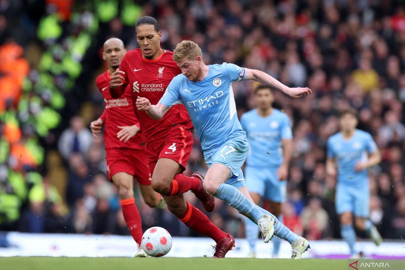 2022-04-10T171904Z_445474975_UP1EI4A1C3QIQ_RTRMADP_3_SOCCER-ENGLAND-MCI-LIV-REPO