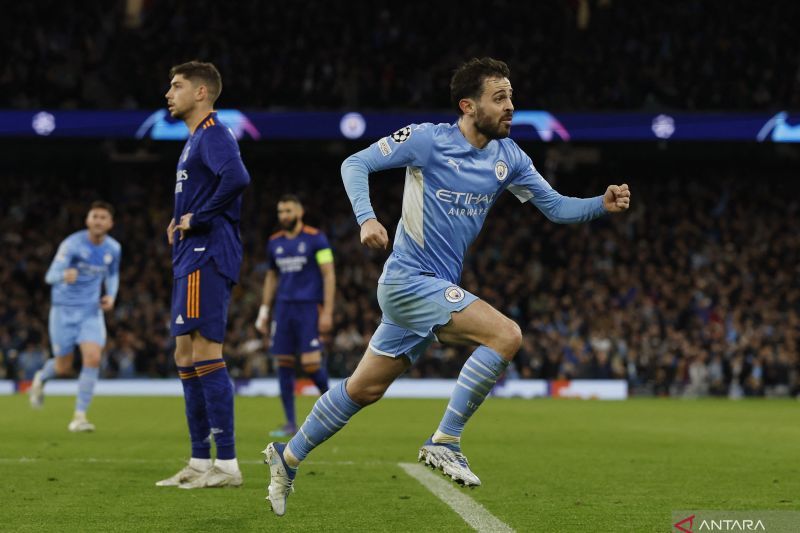 2022-04-26T203652Z_1727902238_UP1EI4Q1L9ENP_RTRMADP_3_SOCCER-CHAMPIONS-MCI-MAD-R