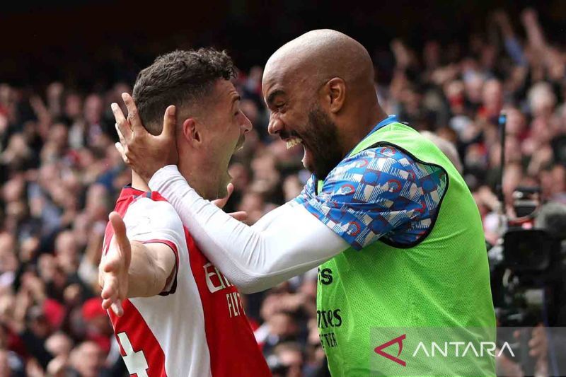 2022-04-23T133750Z_2009299204_UP1EI4N10MUOU_RTRMADP_3_SOCCER-ENGLAND-ARS-MUN-REP