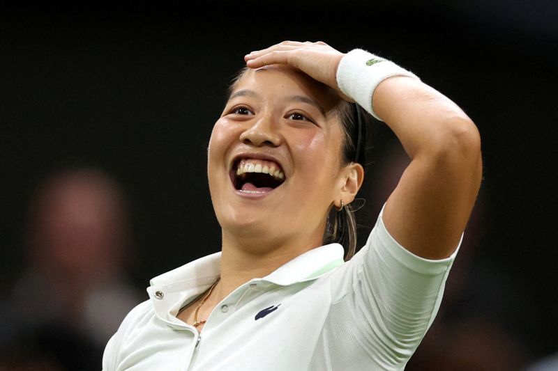 2022-06-28T214636Z_1369115220_UP1EI6S1O5CNW_RTRMADP_3_TENNIS-WIMBLEDON