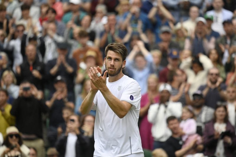2022-07-01T182459Z_768812316_UP1EI711F5LVO_RTRMADP_3_TENNIS-WIMBLEDON