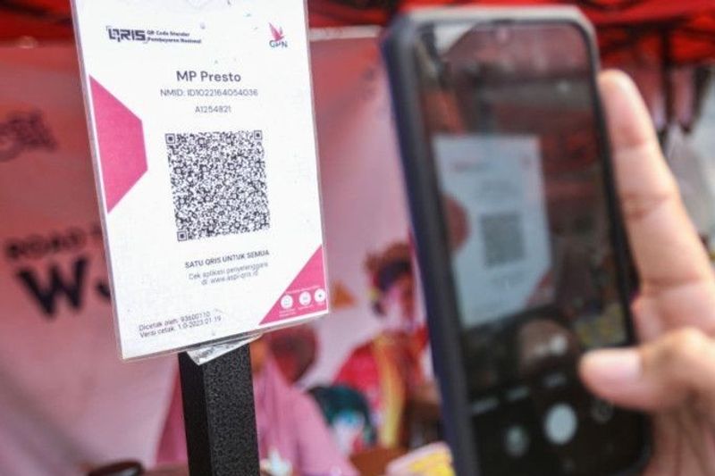 Ilustrasi QRIS , ASEAN QR Code Bantu UMKM