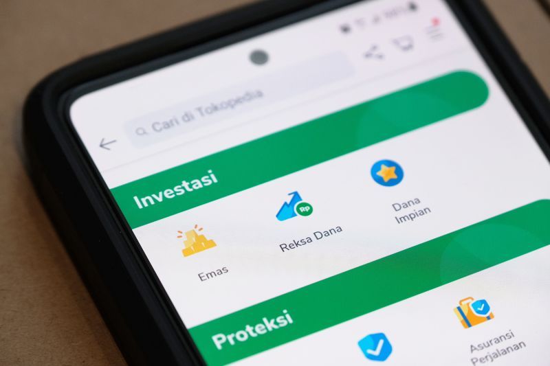 Fitur investasi emas dan reksa dana di platform Tokopedia