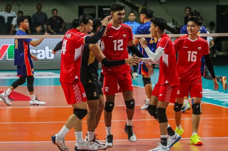 Pevoli Timnas Indonesia melakukan selebrasi