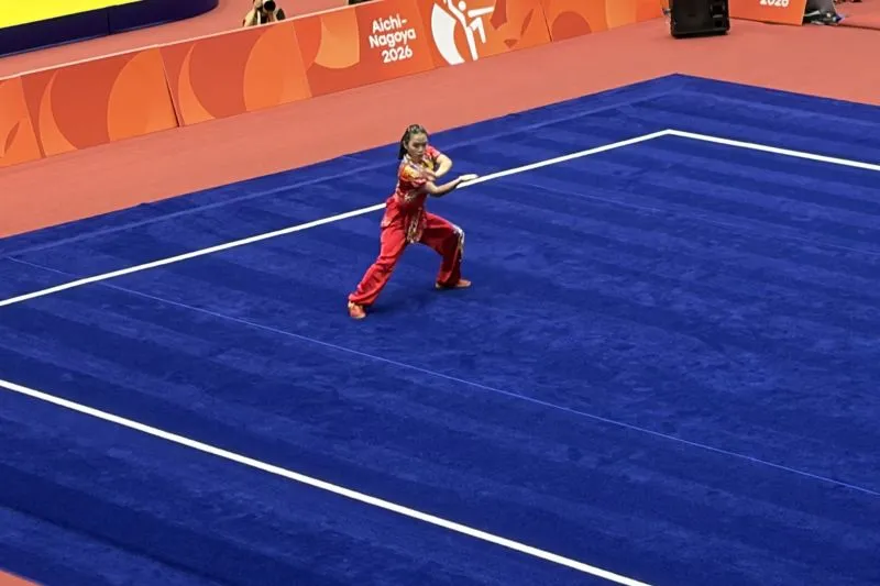 Atlet wushu putri Indonesia Eugenia Diva Widodo Atlet wushu putri Indonesia Eugenia Diva Widodo beraksi dalam nomor changquan putri Asian Games 2026 di Aichi Prefectural Martial Arts Hall, Senin (21/9/2026). (ANTARA/Arindra Meodia)