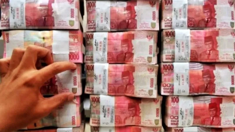 Tumpukan uang rupiah