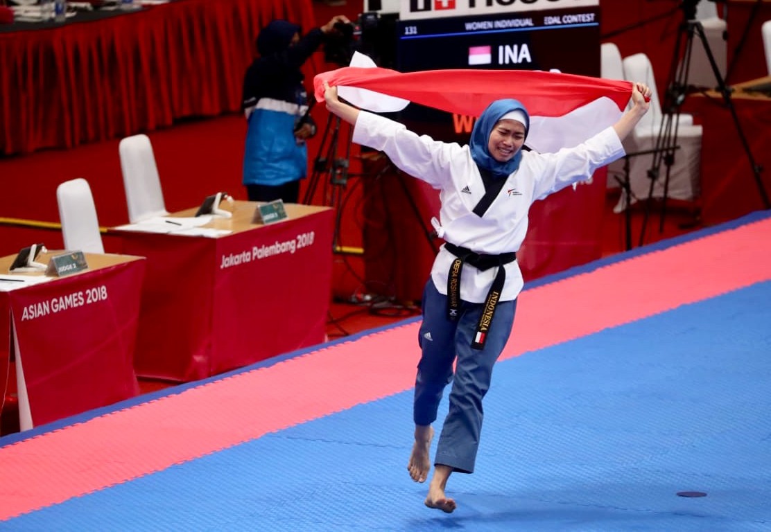 taekwondoin-defia-rosmaniar-peraih-emas-pertama-doc.kemenpora-ivoox.id_