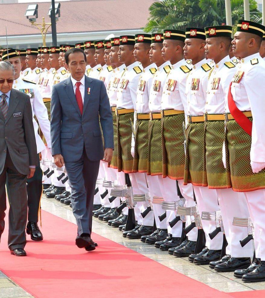 Tiba-di-Putrajaya-Presiden-Jokowi-Disambut-Upacara-Resmi-doc.disambut-resmi-ivoox.id_