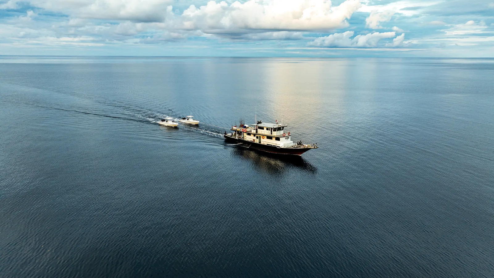 The Big Mackerel underway at dusk