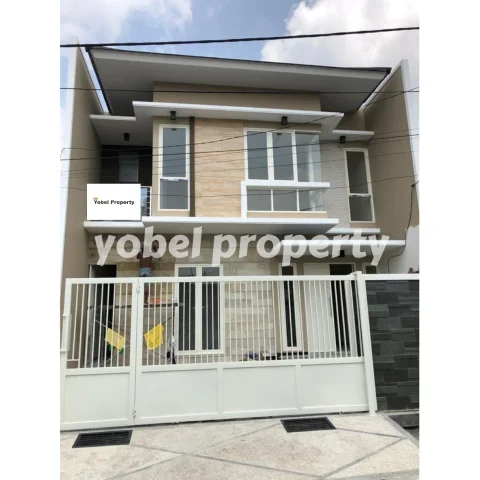 RUMAH MODERN MINIMALIS DUA LANTAI BABATAN PANTAI SURABAYA