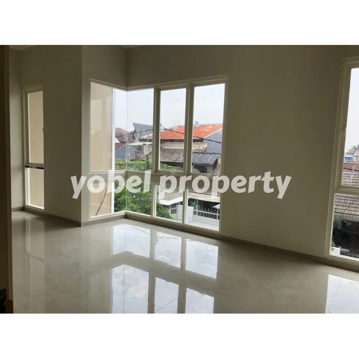 RUMAH MODERN MINIMALIS DUA LANTAI BABATAN PANTAI SURABAYA — foto 4